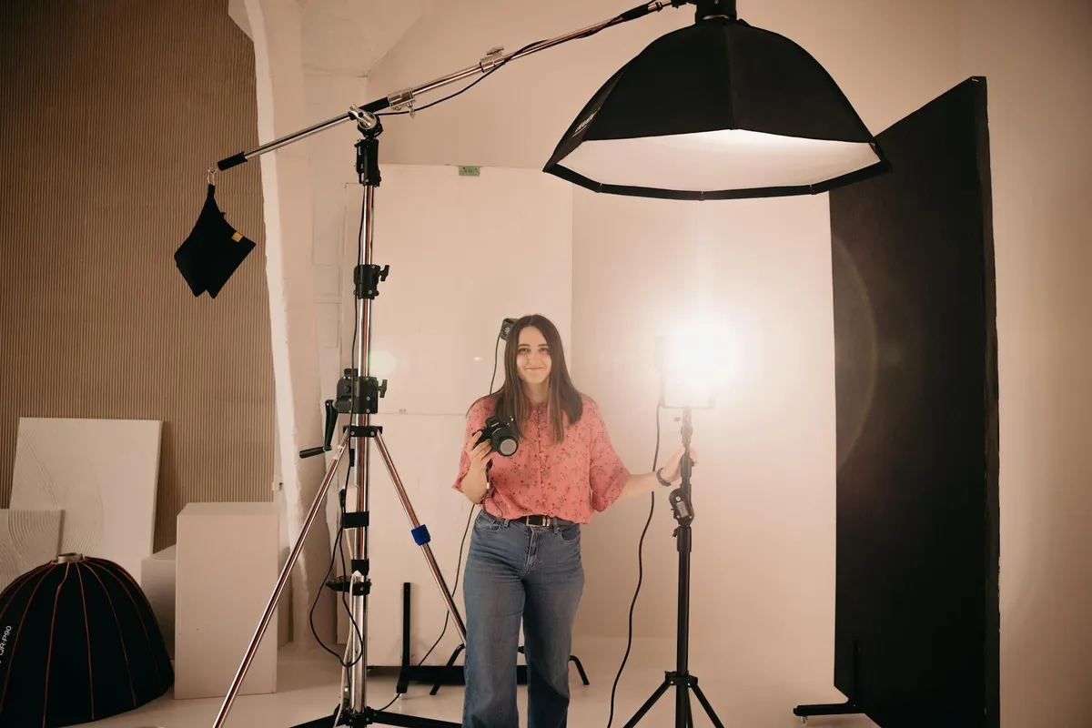 A photographer at work in studio